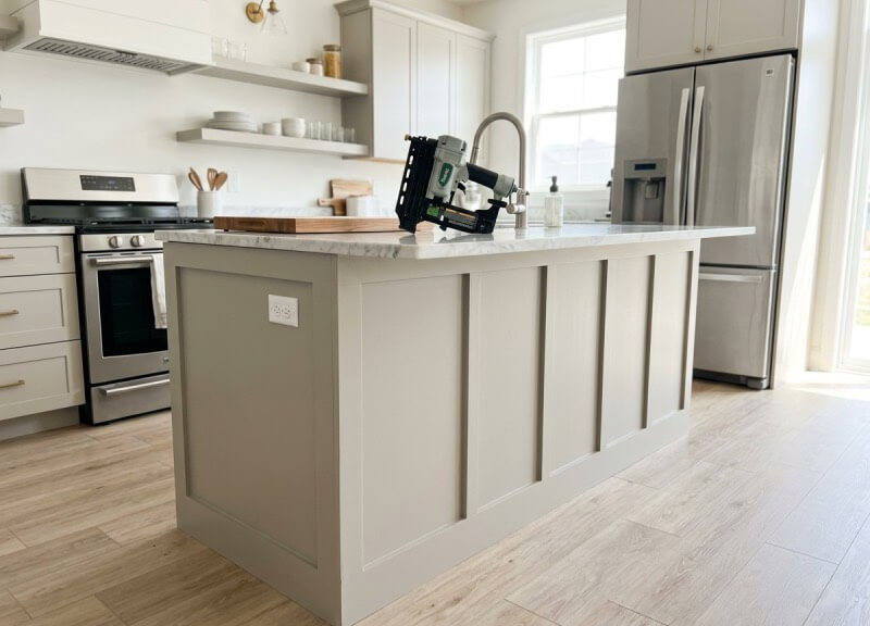 Kitchen island upgraded with custom DIY board and batten MDF trim.